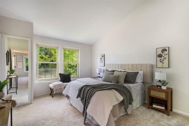 11797 W Aqueduct Dr, Littleton, CO 80127 - bedroom featuring light colored carpet and lofted ceiling
