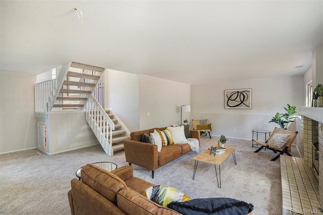 11797 W Aqueduct Dr, Littleton, CO 80127 - living room with stairway, carpet, and plenty of natural light