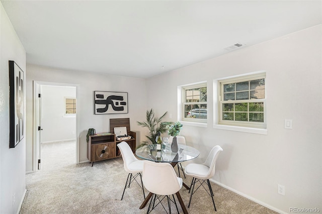 11797 W Aqueduct Dr, Littleton, CO 80127 - dining area with light carpet and baseboards