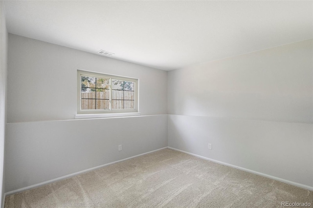 11797 W Aqueduct Dr, Littleton, CO 80127 - spare room featuring carpet and baseboards