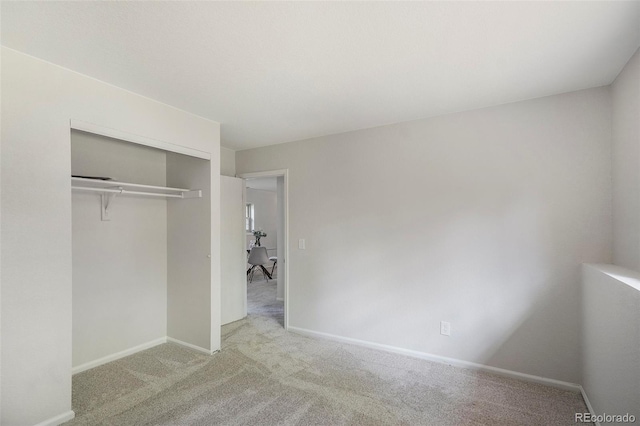 11797 W Aqueduct Dr, Littleton, CO 80127 - unfurnished bedroom featuring carpet flooring and a closet