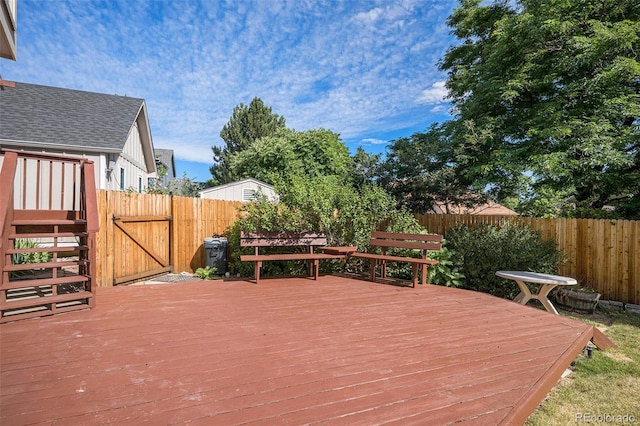 11797 W Aqueduct Dr, Littleton, CO 80127 - wooden deck with a fenced backyard