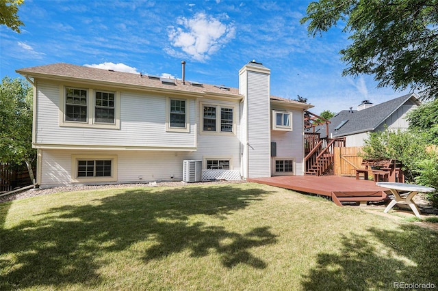 11797 W Aqueduct Dr, Littleton, CO 80127 - rear view of house featuring a deck, a chimney, and stairway