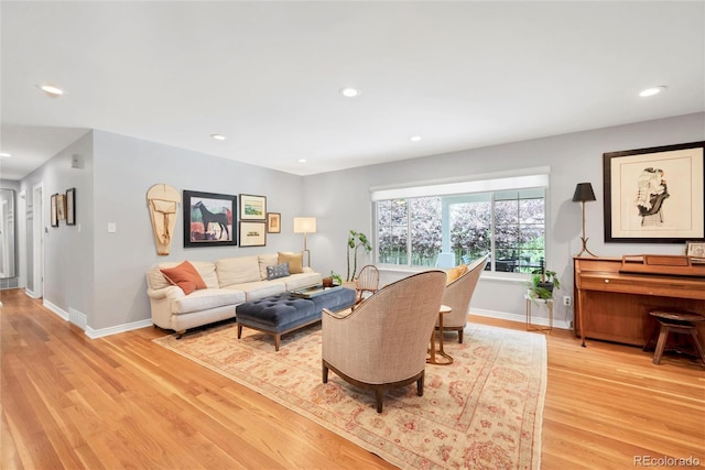 3196 S Newport St, Denver, CO 80224 - living area with light wood finished floors and recessed lighting