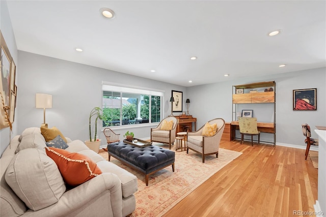3196 S Newport St, Denver, CO 80224 - living room with light wood-type flooring and recessed lighting