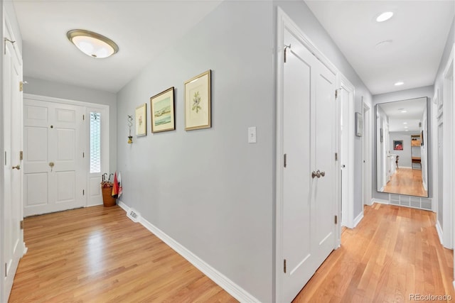 3196 S Newport St, Denver, CO 80224 - foyer with light wood finished floors and recessed lighting