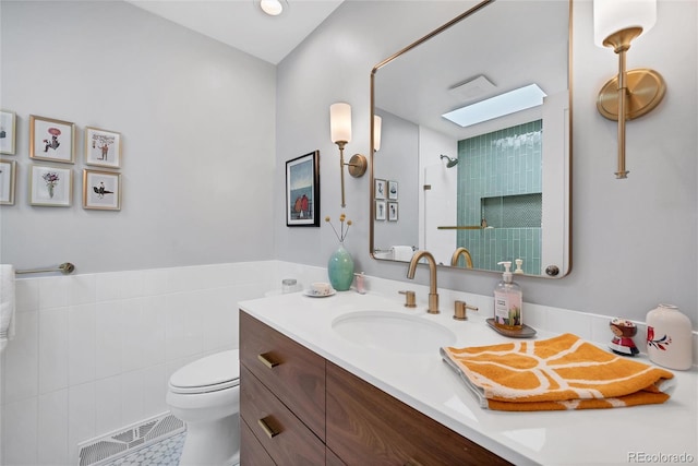 3196 S Newport St, Denver, CO 80224 - bathroom with vanity and tiled shower