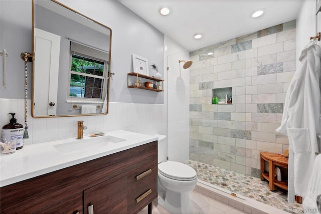 3196 S Newport St, Denver, CO 80224 - full bathroom featuring walk in shower, vanity, a wainscoted wall, and recessed lighting