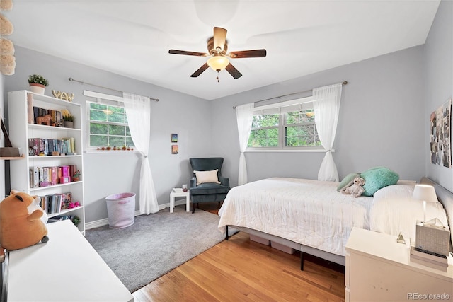 3196 S Newport St, Denver, CO 80224 - bedroom featuring a ceiling fan and light wood-style floors