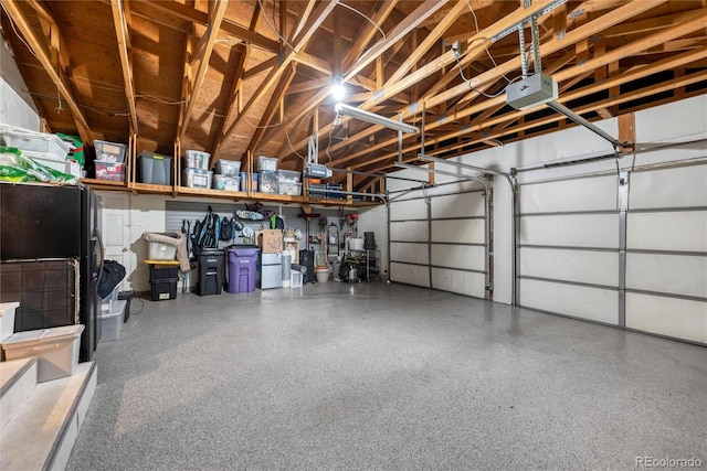 3196 S Newport St, Denver, CO 80224 - garage featuring a garage door opener