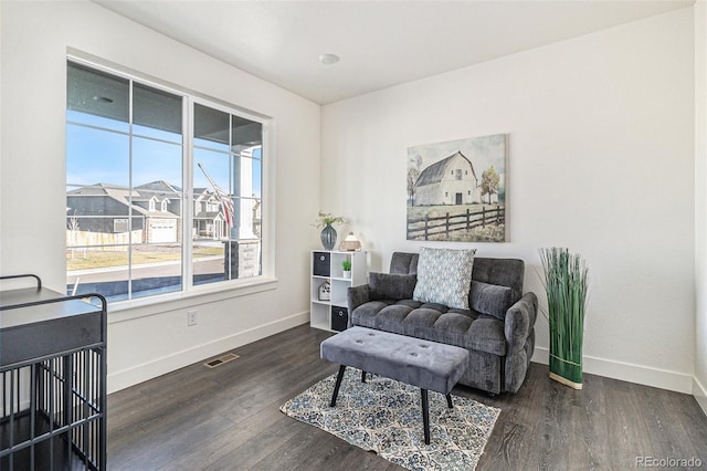 living area featuring dark hardwood / wood-style floors