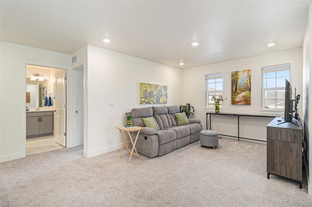 living room featuring light carpet