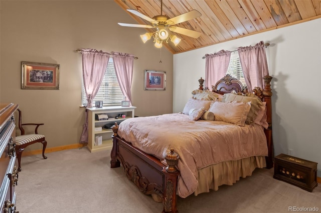 bedroom with light colored carpet, vaulted ceiling, ceiling fan, wooden ceiling, and baseboards
