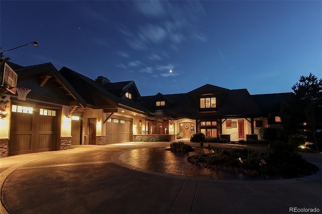 view of front of property with a garage