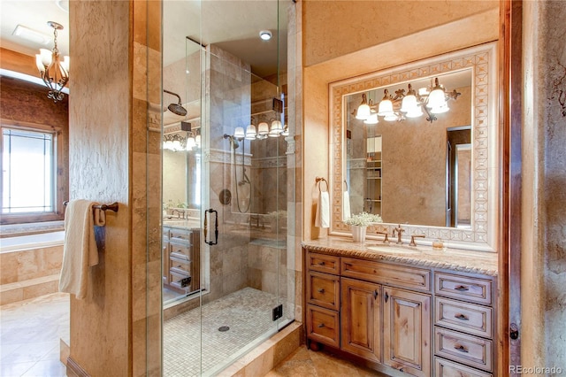 bathroom featuring independent shower and bath, vanity, and tile patterned flooring