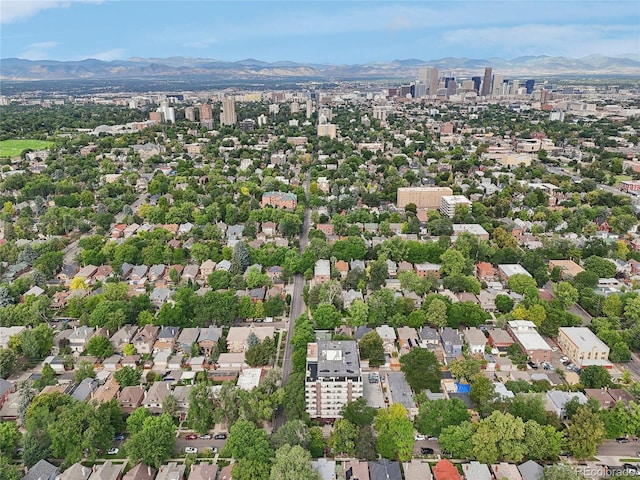 birds eye view of property featuring a mountain view