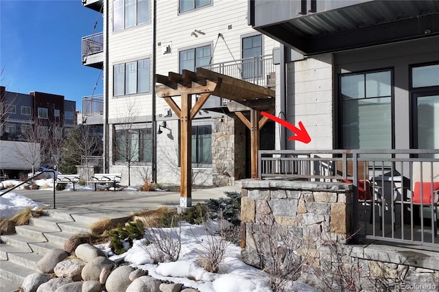 view of snow covered patio