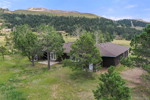 birds eye view of property featuring a mountain view