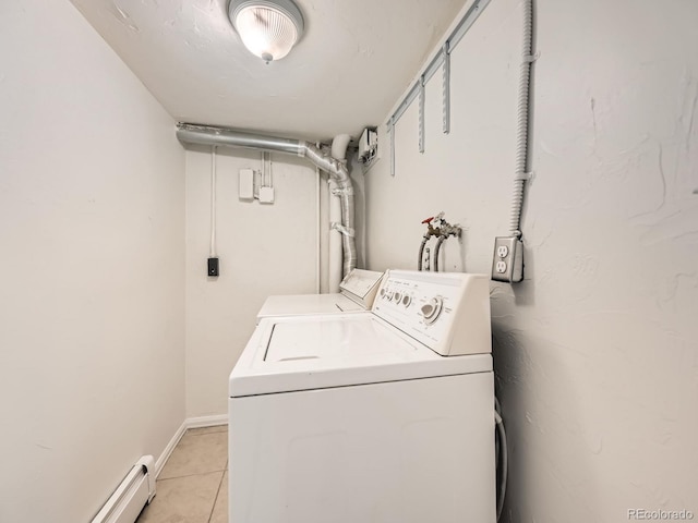 4418 W 11th Ave, Denver, CO 80204 - laundry room with independent washer and dryer, a baseboard radiator, and light tile patterned floors