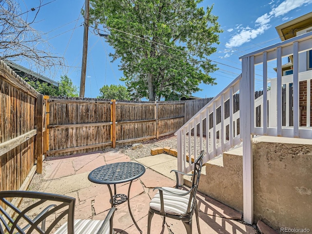 4418 W 11th Ave, Denver, CO 80204 - fenced backyard featuring a patio