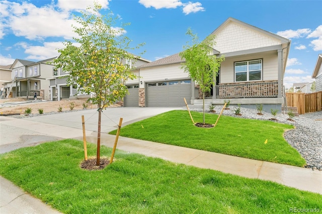14259 Beebalm Ave, Parker, CO 80134 - view of front of house featuring an attached garage, a porch, and driveway