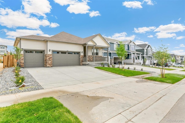 14259 Beebalm Ave, Parker, CO 80134 - view of front of house featuring a garage, a residential view, concrete driveway, stone siding, and a porch
