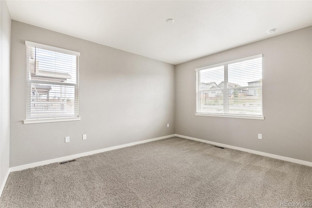 14259 Beebalm Ave, Parker, CO 80134 - empty room featuring carpet flooring, baseboards, and a smoke detector