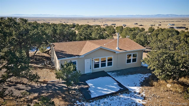 ranch-style house with a mountain view