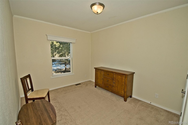 living area featuring ornamental molding and light colored carpet