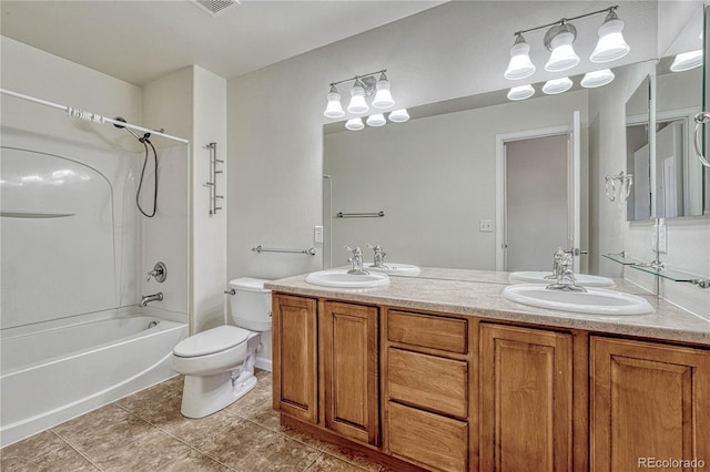 full bathroom featuring tile patterned floors, vanity, bathtub / shower combination, and toilet