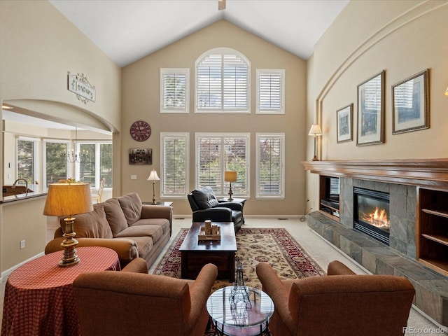 5700 S Benton Cir, Littleton, CO 80123 - carpeted living room with high vaulted ceiling, a fireplace, and baseboards