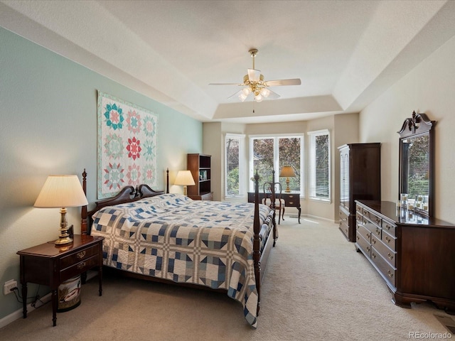 5700 S Benton Cir, Littleton, CO 80123 - bedroom featuring light colored carpet, a raised ceiling, and baseboards