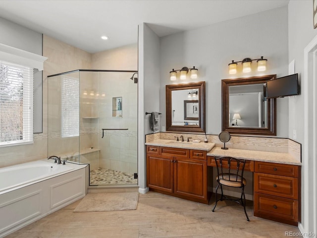5700 S Benton Cir, Littleton, CO 80123 - bathroom with a shower stall, a garden tub, vanity, and wood finished floors