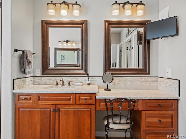 5700 S Benton Cir, Littleton, CO 80123 - bathroom featuring backsplash and vanity