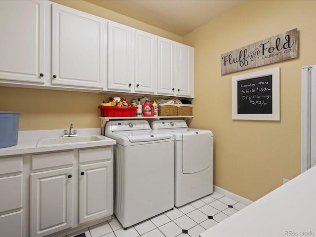5700 S Benton Cir, Littleton, CO 80123 - clothes washing area with washing machine and clothes dryer, cabinet space, and baseboards