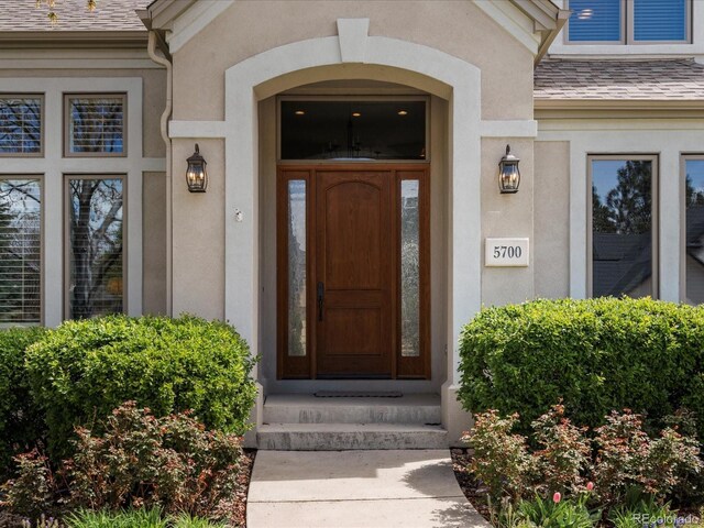 5700 S Benton Cir, Littleton, CO 80123 - entrance to property featuring stucco siding