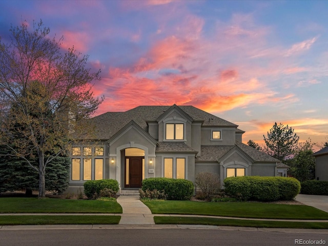5700 S Benton Cir, Littleton, CO 80123 - french country inspired facade with stucco siding and a lawn
