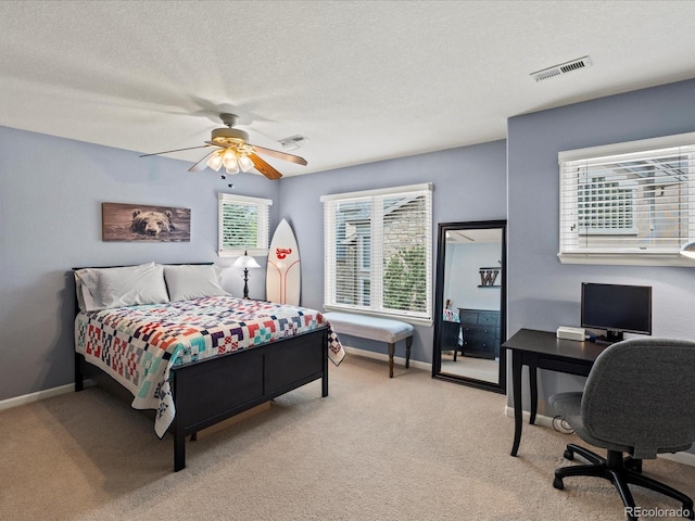 5700 S Benton Cir, Littleton, CO 80123 - bedroom featuring a desk, light carpet, a ceiling fan, baseboards, and a textured ceiling