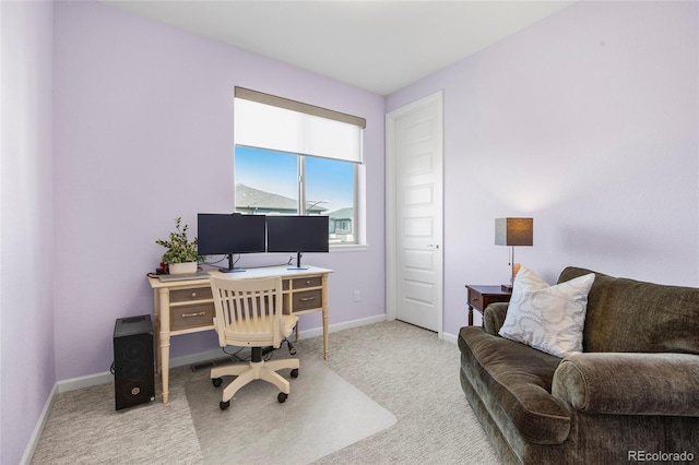 office with baseboards and carpet flooring