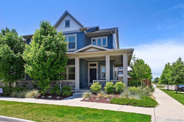 5799 Boston St, Denver, CO 80238 - view of front of property with covered porch