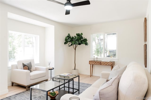 1361 W Custer Pl, Denver, CO 80223 - living area with light wood-type flooring, plenty of natural light, and ceiling fan