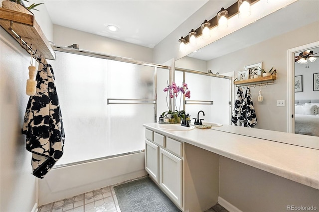 1325 W 112th Ave Unit B, Westminster, CO 80234 - full bathroom featuring vanity, shower / bath combination with glass door, a ceiling fan, and tile patterned floors