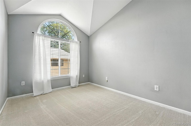 1325 W 112th Ave Unit B, Westminster, CO 80234 - carpeted empty room featuring vaulted ceiling and baseboards