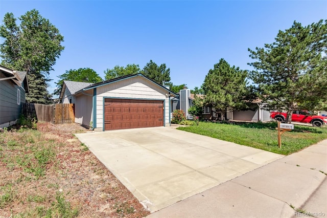 3735 S Lewiston St, Aurora, CO 80013 - ranch-style home featuring a garage and driveway
