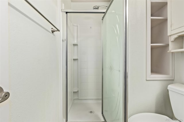 3735 S Lewiston St, Aurora, CO 80013 - full bathroom featuring toilet and a shower stall