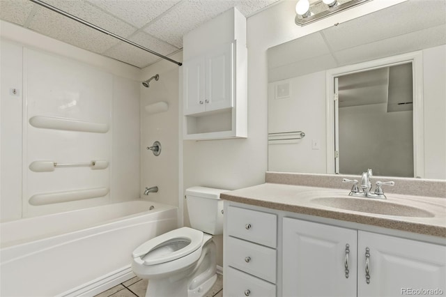 3735 S Lewiston St, Aurora, CO 80013 - bathroom featuring a paneled ceiling, vanity, shower / bath combination, and tile patterned floors