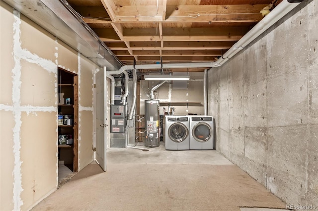 3735 S Lewiston St, Aurora, CO 80013 - unfinished below grade area with washer and dryer and gas water heater