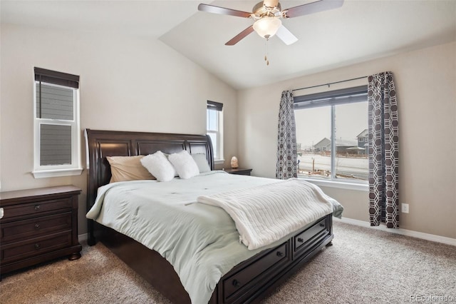 carpeted bedroom featuring vaulted ceiling and ceiling fan