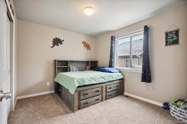 bedroom with light colored carpet