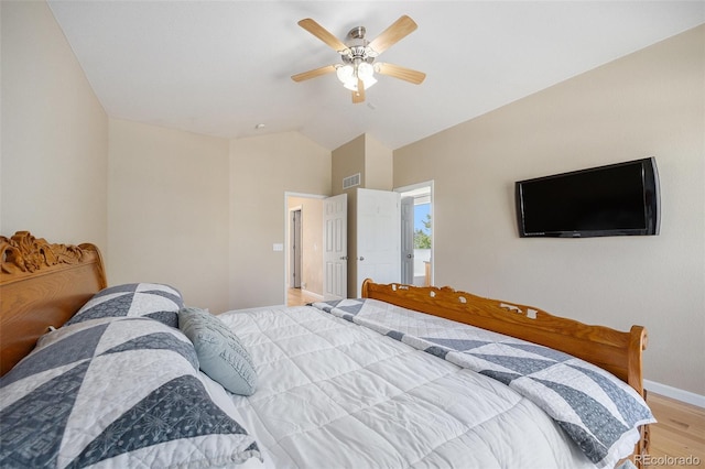 6833 E 115th Ave, Thornton, CO 80233 - bedroom featuring light wood finished floors, vaulted ceiling, and ceiling fan